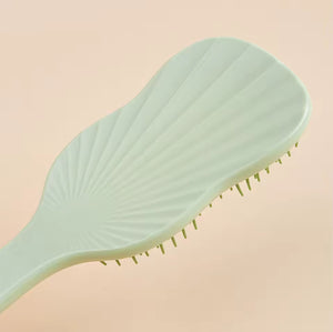 The CurlSculpt Detangler™